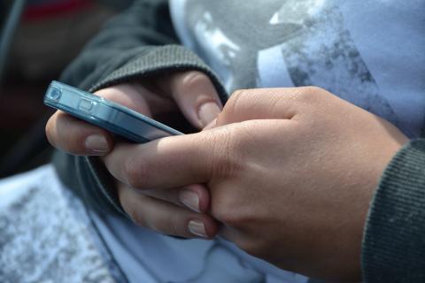 Hands with cellphone