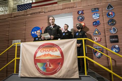 Ross Brockwell exiting the Mars Dune Alpha habitat at NASA's Johnson Space Center in Houston, Texas.