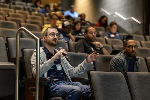 People inside the Ferst Center during a Q&A session
